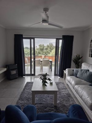 Living room facing sliding door